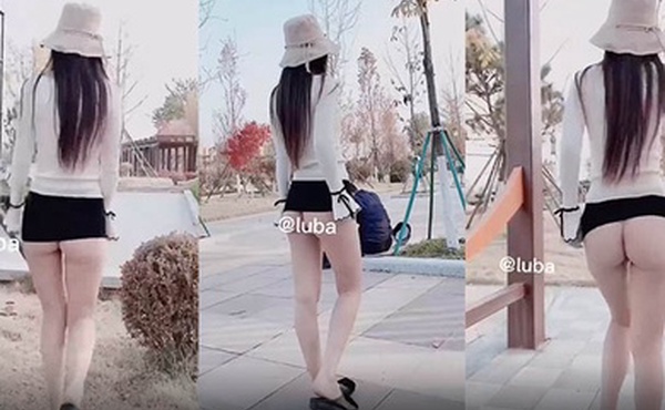 妹子在街上露屁股走街哦秀性感的屁股